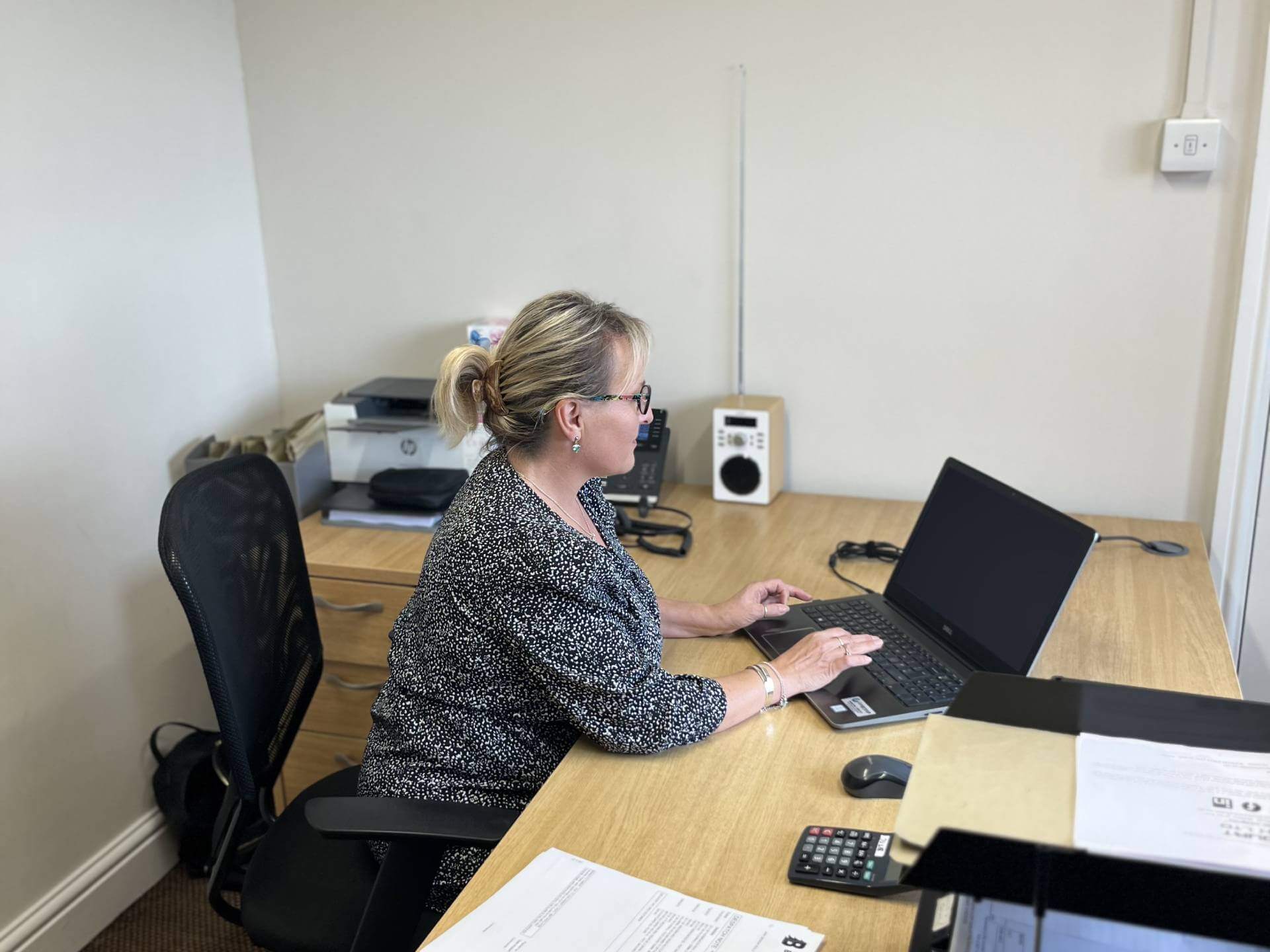 Lady sat at computer